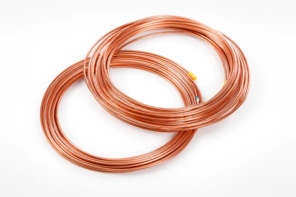 ACR copper tubing coil for HVAC and refrigeration applications with white background