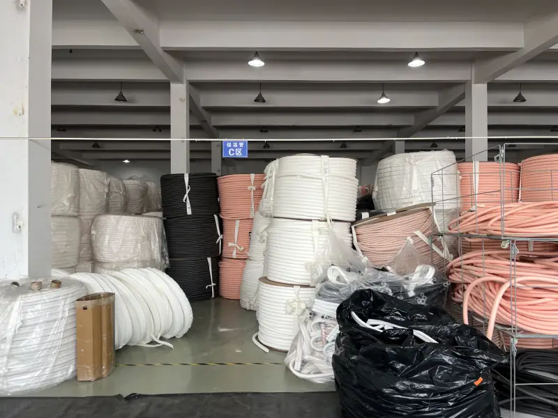 Finished insulated copper tube coils in the Area C finished goods warehouse of a copper tube manufacturer