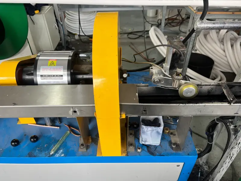 Close-up of motor drive unit on the insulated copper tube production line in a copper tube factory