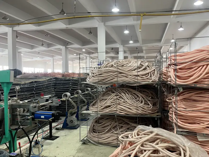 Extrusion machine producing insulated copper tubes in the workshop of a copper tube factory